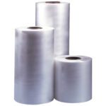 Three rolls of clear plastic film stand vertically, with heights descending left to right, their glossy finish shining under light. Perfect for packaging, the left roll is MH-USA 20 x 60 Gauge x 4375 Polyolefin Shrink Film (1 Roll/Case).