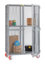 A gray Little Giant All-Welded Mobile Storage Locker with mesh doors is partially open, showing boxes and containers on the shelf above a black toolbox and larger cardboard boxes. Stylish red wheels add color.