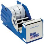 The 3 Tape Logic® Multi Roll Table Top Dispenser comes in blue, accommodates two tape rolls, and has a metal cutting blade. It features Tape Logic branding on the front along with a warning about the sharpness of its blade for safety.