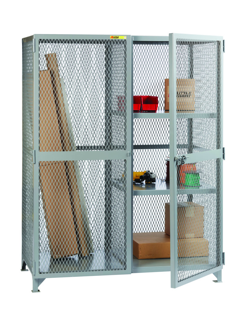 A metal storage cage with one door ajar reveals shelves like the Little Giant All-Welded Combination Cabinets w/2 Half Shelves, holding items like cardboard boxes and red bins. Large cardboard pieces lean inside, while the mesh design allows visibility.