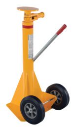 The Vestil Stabilizing Ratchet Jack 40,000 Lb includes a bright yellow hydraulic jack stand with two black wheels, a long grey handle, and a triangular base for stability. Its sturdy design features a round lifting plate for heavy loads while ensuring mobility.