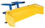 The Vestil Fork Mount Snow Plow Push Box 72 In Wide features a yellow and blue design with a strong chain and metal connectors. Its yellow blade is designed for efficient snow removal, with angled ends for optimal clearing, while the blue frame securely mounts to the vehicle.