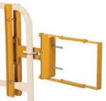 A yellow and white metal bracket, similar to the Vestil Yellow Self-Closing Gate 16 To 26 In, features multiple bolt holes and is mounted on a white frame, perfect for attaching equipment or supporting structures.