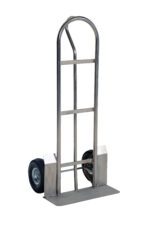 The Vestil Ss P Handle Truck-600Lb Pneumatic Wheels boasts a silver metal frame, curved handle, and durable pneumatic wheels. Its flat base is perfect for transporting heavy items, making it ideal for moving boxes or furniture effortlessly with its sturdy design.