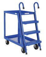 The blue Vestil Stock Picker ladder cart is a mobile warehouse tool with three grip-tread steps, two handles, and four wheels. It features front wheel stoppers for stability, a flat top platform, and measures 22x36 inches in durable rubber and steel.