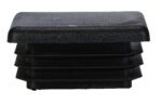 The Vestil Square Safety Handrail Plastic End Cap is a black, rectangular plastic cap with a textured surface and ribbed sides, designed to fit snugly into and cover the end of a hollow rectangular tube or pipe for protection and a polished finish.