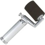 The MH-USA K-1 Fountain Roller is a handheld device with a sleek metal handle and black foam roller. Marsh is engraved near the roller, and it includes a textured grip, ensuring precision and comfort during use.