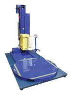 The Vestil Stretch Wrap Machine Option-Scale boasts a blue industrial design with a large circular platform marked by safety striping. A vertical arm wraps items efficiently, while its side-mounted control panel and optional scale increase functionality.