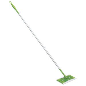 A green and silver Swiffer® Sweeper, featuring a rectangular head and long handle, elegantly positioned diagonally against a plain white background.
