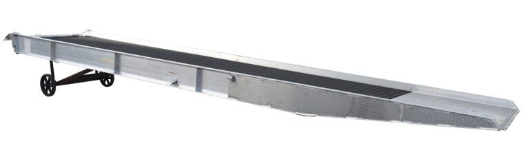 SY-167230_A.jpg The Vestil Alum Yard Ramp Steel Grating 74in x 30 ft is a long aluminum ramp with side rails, a black grooved surface, support legs, and wheels at one end for easy transport and loading of wheeled equipment or vehicles.
