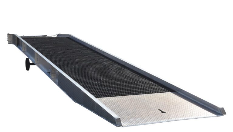 The Vestil Alum Yard Ramp Steel Grating 86 Inx36 Ft is ideal for loading or unloading with its robust metal build and solid edges. It measures 86 inches by 36 feet, features a ground-leading angle, and has side wheels for easy mobility.