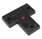 The Vestil Specialty T-Shaped Molded Bumper 3X22X22 features a durable black rubber base with four holes and a central small red circle, combining precision and robust design.