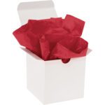 An open white gift box reveals the vibrant touch of crumpled MH-USA 15 x 20 Scarlet Gift Grade Tissue Paper (960 Sheets), making a bold statement.