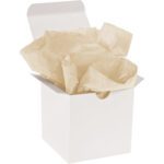 A white gift box with an open lid reveals charming MH-USA 20 x 30 Tan Gift Grade Tissue Paper (480 Sheets) inside, adding subtle elegance to any present.