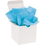 An open white gift box reveals crumpled MH-USA 20 x 30 Turquoise Gift Grade Tissue Paper (480 Sheets), adding an elegant touch to its contents.