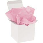 An open white gift box reveals crumpled MH-USA 20 x 30 Dark Pink Gift Grade Tissue Paper (480 Sheets), adding elegance with its vibrant hue.