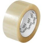 A roll of 2 x 110 yds. Clear Tartan™ Box Sealing Tape 302 (36/Case) features the brand name on the inner core and provides durability and a perfect seal for packaging needs.