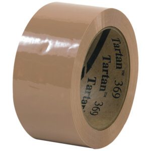 A 2 x 110 yds. roll of glossy, tan Tartan™ Box Sealing Tape 369 is displayed upright on a white background, with the inner cardboard ring showcasing the brand name repeatedly to emphasize its durability and quality.