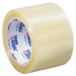 The 3 x 110 yds. Clear Tape Logic® Lbs160 Industrial Tape features a white core with blue and red branding, ideal for industrial use. Each case includes 24 rolls perfect for easy shipment securing.