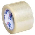 A 3 x 55 yds. roll from the Tape Logic® Lbs350 Industrial Tape 6 Pack features a glossy, semi-transparent finish with tape logic printed inside in blue and red.