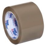 A case of 3 x 55 yds. Tan Tape Logic® Lbs350 Industrial Tape containing 24 rolls awaits use; the industrial-strength tape is ideal for sealing boxes and packages, with the brand name proudly displayed inside.