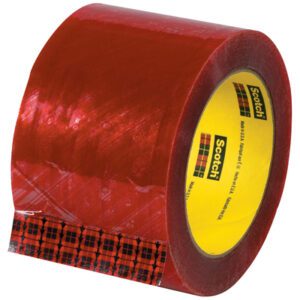 A partially unrolled roll of 3 x 110 yds. red Scotch tape with a yellow core, branded as 3M Security Message Box Sealing Tape 3779, sits by its packaging. The brand logo is visible on the inner side.