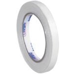 A 12-pack of 1/2 x 60 yds. Tape Logic® 1300 Strapping Tape showcases its textured, partially unraveled white adhesive and visible cardboard core with the brand name printed prominently on a crisp white background.