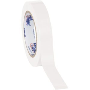 A partially unrolled strip of Tape Logic® Solid Vinyl Safety Tape, 1 x 36 yds., stands on a white surface. The inner core shows blue text and logos.