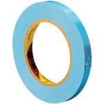 A 1/2 x 60 yd. roll of Scotch Strapping Tape 8896 with a yellow core and red plaid branding is partially unrolled, revealing its sticky side, and comes in a convenient 12-pack per case.