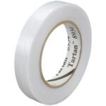A pack of 12 rolls of Tartan™ Filament Tape 8934 (3/4 x 60 yds.) features a glossy finish with visible horizontal fibers for added strength. The inside cardboard core reads Tartan 8934, ensuring each roll is ready to handle tough tasks stylishly and effectively.