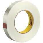 A roll of clear Scotch tape with a yellow inner core and red plaid label, similar to the 1 x 60 yds. (6 Pack) 3M™ 880 Strapping Tape, lies on a white background.