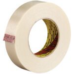 The 1 x 60 yds. 3M™ 8919 Strapping Tape has a beige color, a red plaid strip near the edge for identification, and a durable yellow core with black text. Its sticky side ensures secure item fastening.