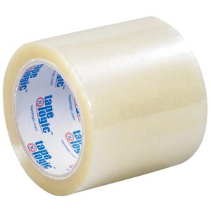 A roll from the 4 x 72 yds. Clear (6 Pack) Tape Logic® 2 Mil Acrylic Tape is angled to display its white core with a blue and red Tape Logic logo, highlighting its glossy finish, thickness, and durability.