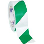 The Tape Logic® Striped Vinyl Safety Tape, 2 x 36 yds., features green/white diagonal stripes and comes in a 3 Pack. Its partially unrolled, highlighting its contrasting pattern.