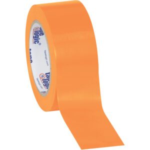 A partially unrolled roll of Tape Logic® Solid Vinyl Safety Tape (2 x 36 yds. Orange, 3 Pack) reveals its adhesive side, with the core displaying the Tape Logic logo.