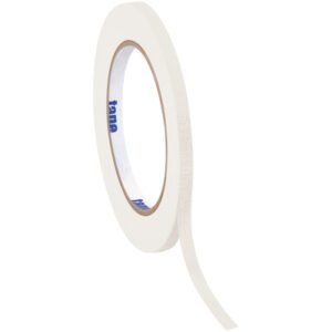 A roll of 1/2 x 60 yds. white adhesive tape from the Tape Logic® Masking Tape (12 Pack) is partially unwound, exposing the sticky side and revealing the inner cardboard core with blue text against a plain white background.