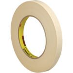 Displayed elegantly at an angle, the 1/2 x 60 yds. (6 Pack) 3M™ 202 Masking Tape - 6 PER CASE features a beige exterior and yellow branded core, set against a plain white backdrop.