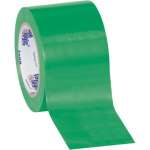 A roll of 3 x 36 yds. green adhesive tape from the Tape Logic® Solid Vinyl Safety Tape collection is slightly unrolled, revealing its glossy surface, with the inner ring branded in blue and red. This (3 Pack) set combines style and reliability.
