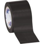 A roll of 3 x 36 yds. Black Tape Logic® Solid Vinyl Safety Tape (16/Case) is partially unrolled, revealing the inner branding. Its glossy finish enhances durability and visibility under light.