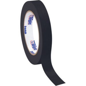 The 3/4 x 60 yds. Tape Logic® black masking tape is slightly unrolled, displaying a matte surface and flexible texture. It features a white inner core with blue and red text, branded visibly, available conveniently in a 12-pack for any project.