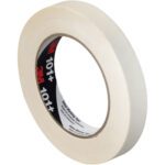 A roll of beige 3M Value Masking Tape 101+ (3/4 x 60 yds,) with a black and red 101+ inner label, is standing on its side, revealing part of the adhesive. This versatile tape comes in a handy 12-pack.
