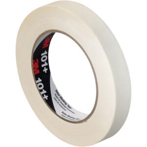 A roll of beige 3M Value Masking Tape 101+ (3/4 x 60 yds,) with a black and red 101+ inner label, is standing on its side, revealing part of the adhesive. This versatile tape comes in a handy 12-pack.