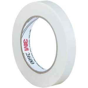 A 3/4 x 60 yds. roll of 3M™ 2600 Masking Tape stands upright on a white background, labeled 3M 2600, with a smooth outer surface and slight texture. Each case contains 48 rolls.