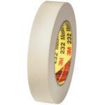 The 1 x 60 yds. roll from the 12 Pack of 3M High Performance Masking Tape 232, featuring a beige look with a plaid-patterned label inside, stands upright against a simple white background.