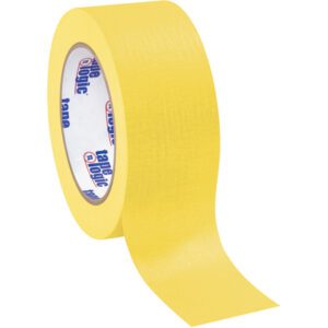 A partially unrolled 2 x 60 yds. Yellow Tape Logic® Masking Tape (12 Pack) reveals branding inside, with its adhesive side concealed and a slightly glossy texture visible.