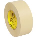 The 2 x 60 yds. 3M™ 231 Masking Tape, featuring the Scotch logo and product info on beige tape with a yellow inner lining, comes in a case of 24 for versatile use.