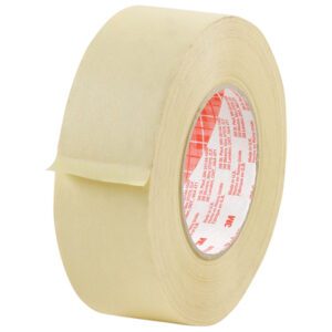 A roll of 2 x 60 yds. 3M™ 2380 Masking Tape (24/Case) stands upright with a peeled edge showing the adhesive. Its inner core features red text and a pattern, set against a plain white background highlighting its functional design.