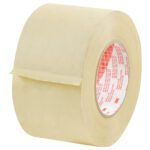 A large roll of beige 3 x 60 yds. 3M™ 2380 Masking Tape (12/Case) with a red and white label on the inner core is partially unrolled, showing a peeled segment.