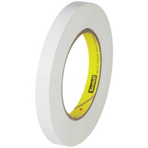 A 3M™ 256 White Flatback Tape roll, measuring 1/2 x 60 yds, displays a yellow inner Scotch label and is positioned vertically, highlighting its width and thickness.