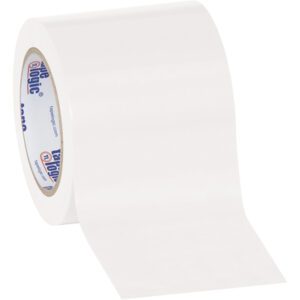 A roll of clear packing tape with an unrolled strip shows its blue and red core against a white background, similar to the 4 x 36 yds. White Tape Logic® Solid Vinyl Safety Tape (12 Rolls/Case), ideal for efficient sealing tasks.